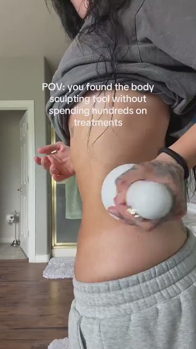 Customer using the Lymphatic massager at home to help with puffiness.